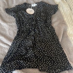 Black and white polka dot mini dress from Princess Polly